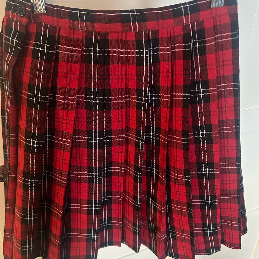 Vintage plaid skirt. Red and black plaid. No size but fits like 00/0.